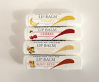 Photo of the Alta Fauna Edibles Lip Balms Bundle on a white background.  Selection includes Banana, Cherry, Mandarin Orange and Root beer.