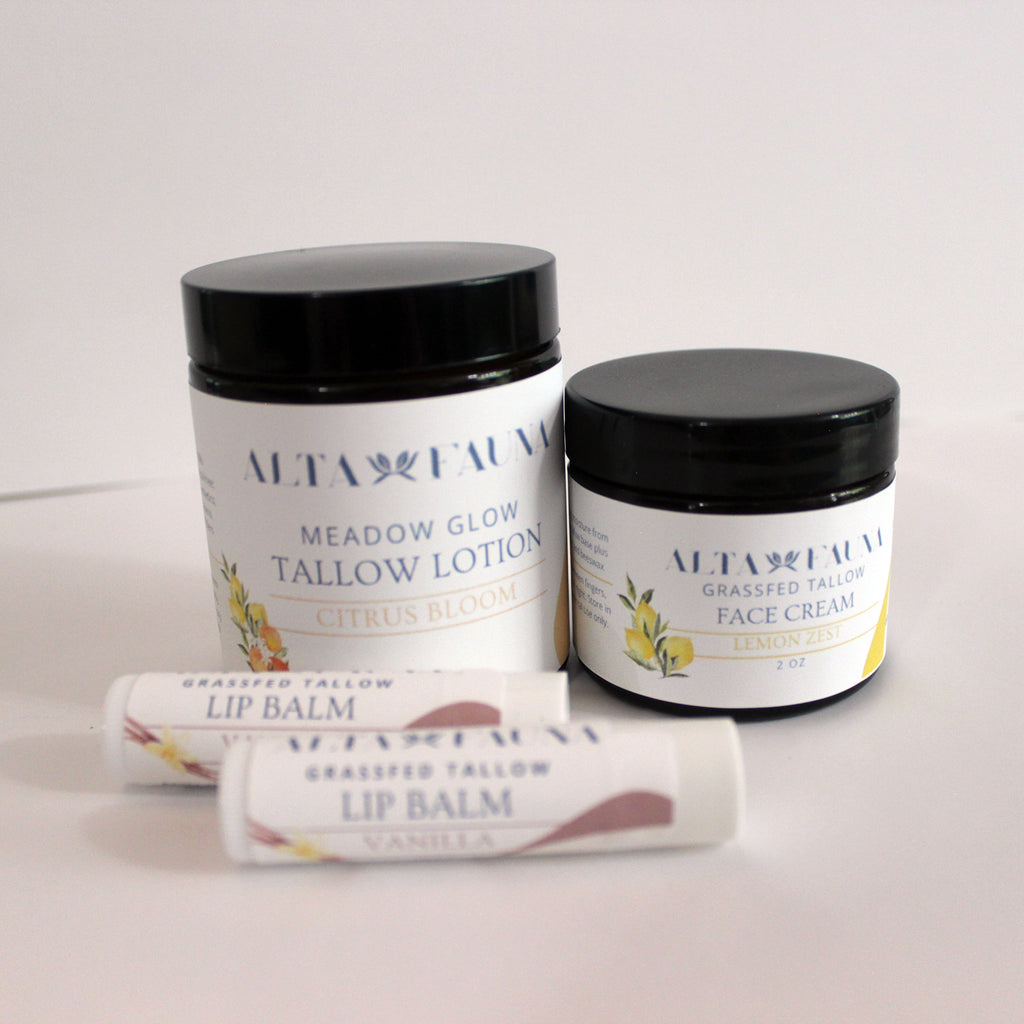 Alta Fauna Citrus Bundle with Tallow Lotion, Face Cream and Lip Balms on a white background.