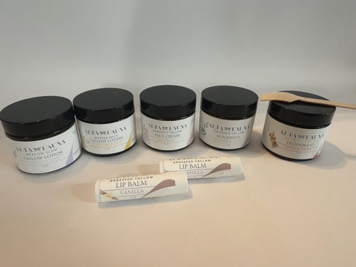 Alta Fauna Complete Bundle with tallow lotion, face cream, deodorant, sun shield, and lip balm arranged in box