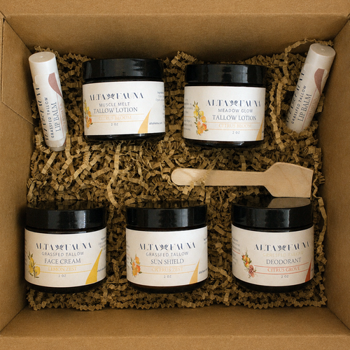 Alta Fauna Complete Bundle with tallow lotion, face cream, deodorant, sun shield, and lip balm arranged in box