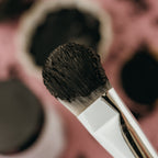 Alta Fauna charcoal and clay face mask on a brush