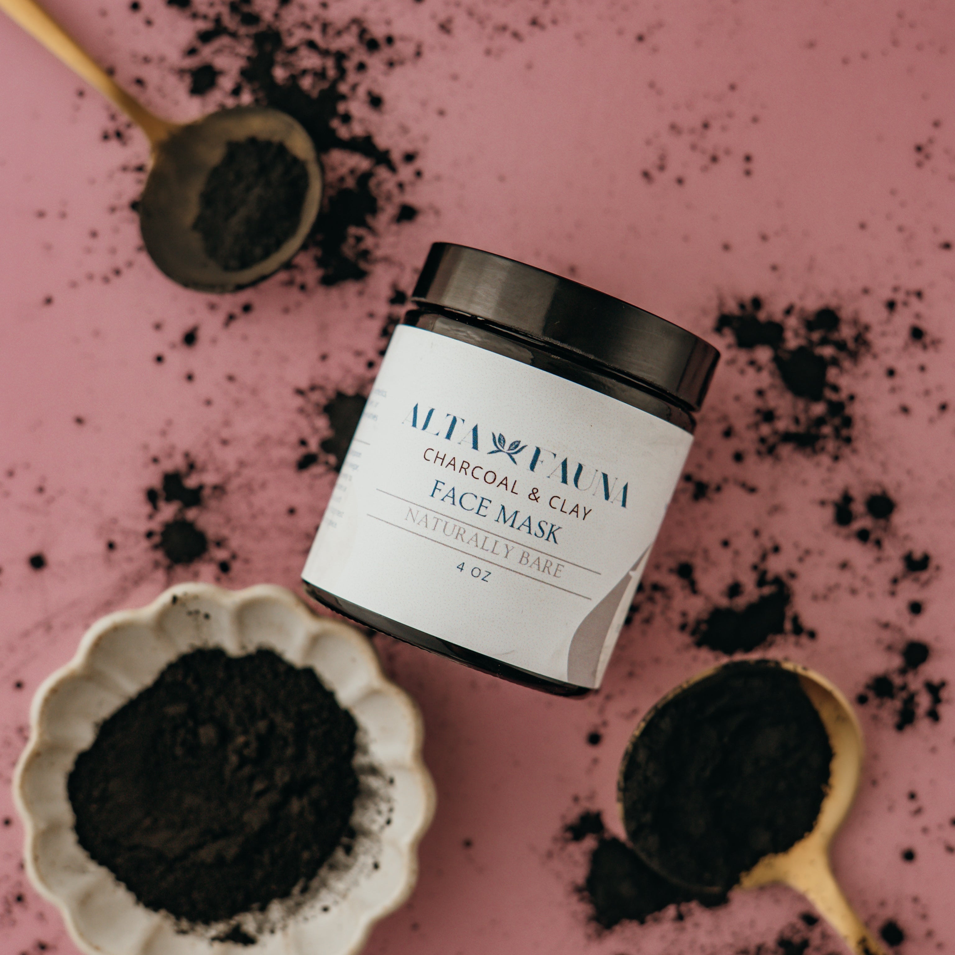 Alta Fauna charcoal and clay face mask with a pink background