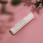 Close‑up of Alta Fauna Grassfed Tallow Lip Balm with mineral zinc for protective daily lip care. Close up of label and ingredients.
