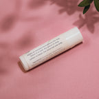 Close‑up of Alta Fauna Grassfed Tallow Lip Balm with mineral zinc for protective daily lip care. Close up of label and ingredients.